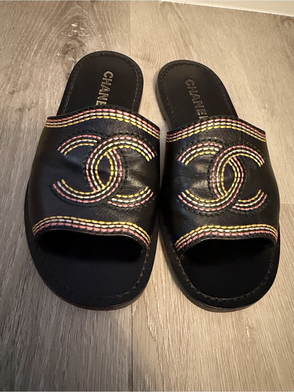 CHANEL Black Leather Slide Sandals with Pink and Yellow Stitching